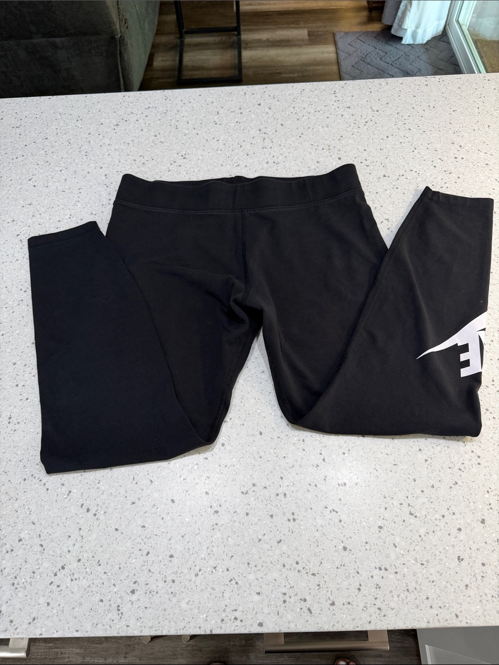 Nike Black Leggings with White Swoosh Accent